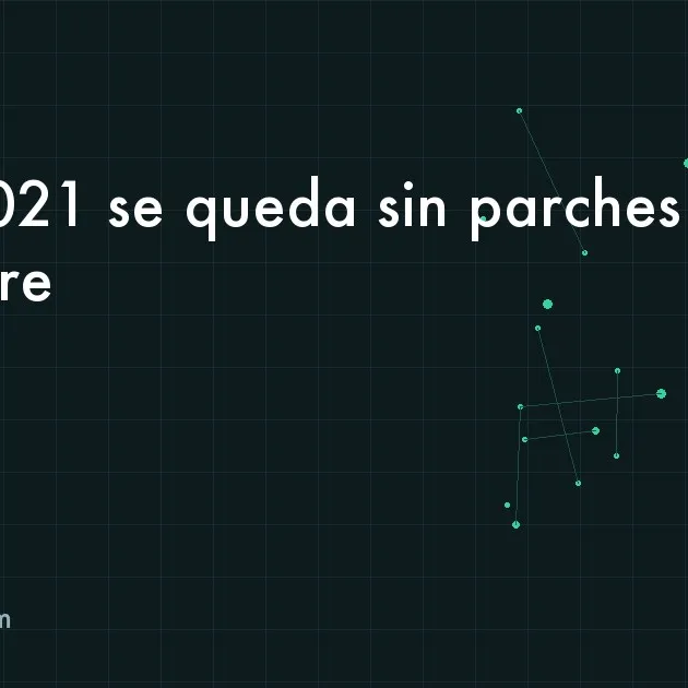 Escritorio de oficina con una hoja de cálculo abierta y un aviso de fin de soporte en la pantalla