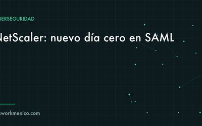 Equipo de red en un rack de centro de datos con una alerta de seguridad en la pantalla de administración