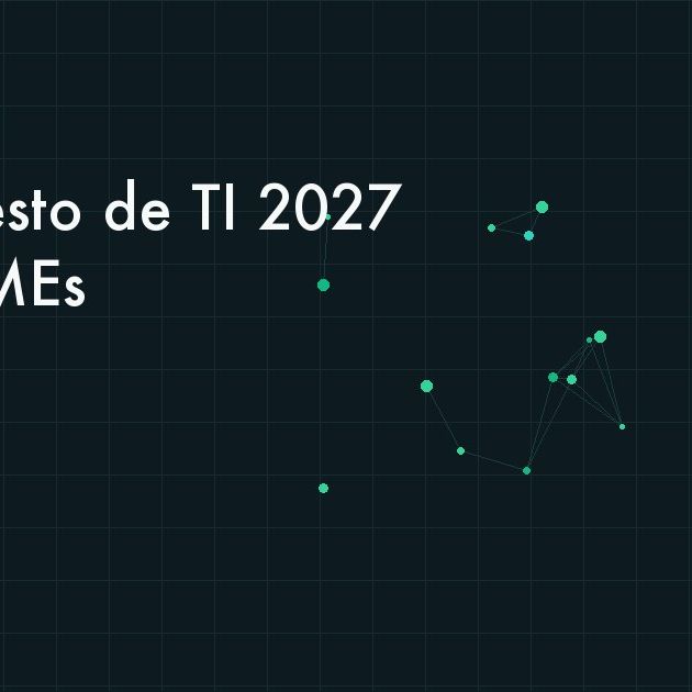 Directivos revisando el presupuesto de tecnología del próximo año sobre una mesa de juntas