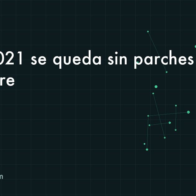 Escritorio de oficina con una hoja de cálculo abierta y un aviso de fin de soporte en la pantalla